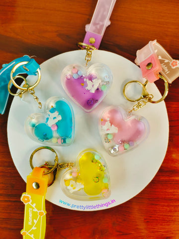 Unicorns Floating in Heart Keychains